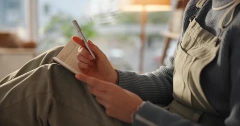 Relax, thinking and writing with hands of person in home for agenda, calendar or Stock Footage 312718507