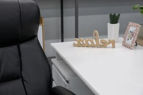 Relax time in office. Empty workplace with word relax. Rest on work Stock Photos