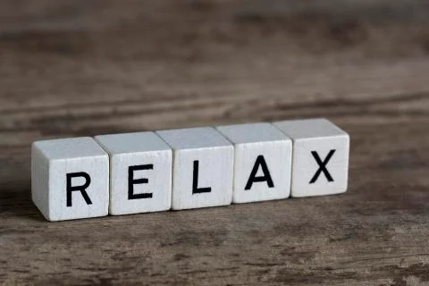Relax, written in cubes Stock Photos