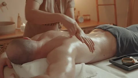 Relaxation And Curing Back Pain By Thai Massage, Professional Masseuse Rubbing Video stock 343513626