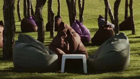 Relaxation area in the park with soft seating for visitors Stock Footage 341437428