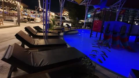 Relaxation area by the pool Video stock 309128919