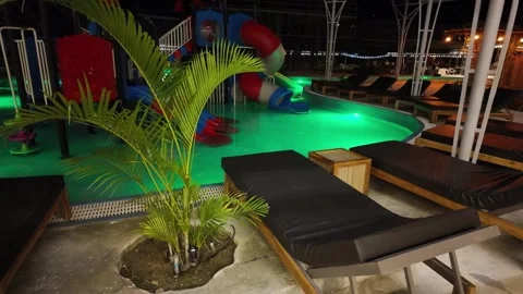 Relaxation area by the pool Video stock 309128999