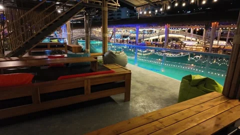 Relaxation area by the pool Video stock 309129099