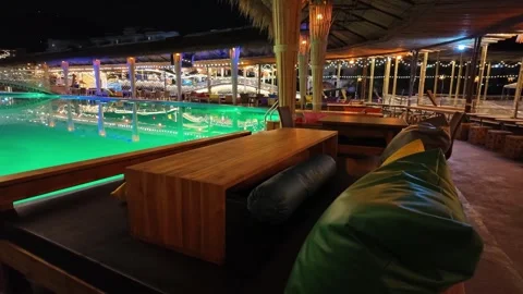 Relaxation area by the pool Video stock 309129246