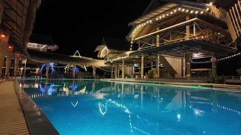 Relaxation area by the pool Stock-Footage 310493920