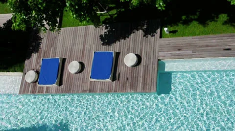 Relaxation area for sunbathing by/beside the pool. Video stock 24694589