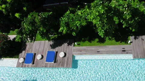 Relaxation area for sunbathing by/beside the pool. Video stock 24694591