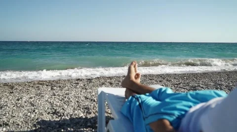 Relaxation man in beach Sunbed Stock Footage 68897032