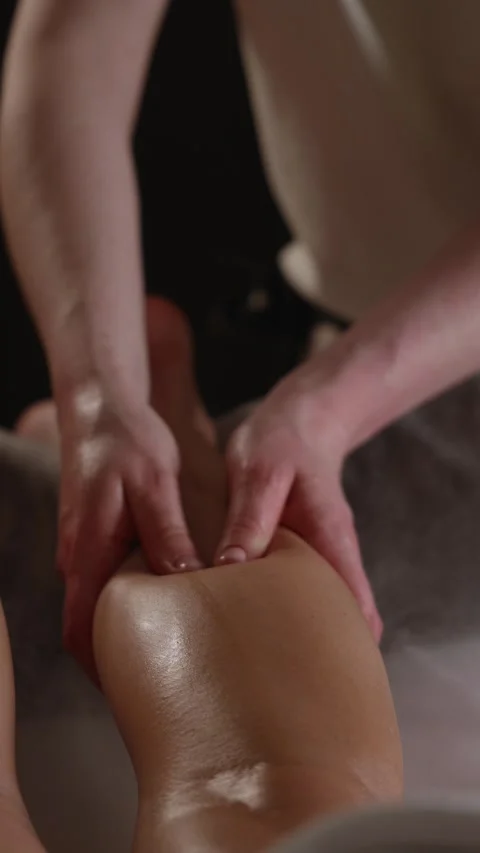 Relaxation massage session at a wellness center in the evening Stock Footage 341280852