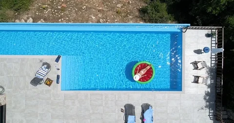 Relaxation in the pool. Aerial view Stock Footage 116899526
