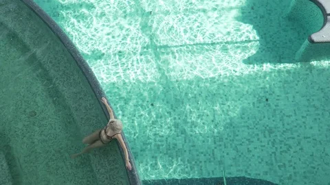 Relaxation in the pool Stock Footage 127152829