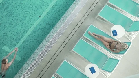 Relaxation in the pool Stock Footage 127152885