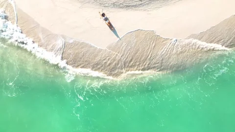 Relaxation as Sunbathing on the beach Stock Footage 199427900