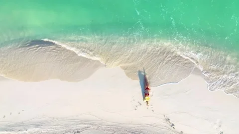 Relaxation as Sunbathing on the beach Stock Footage 200152749