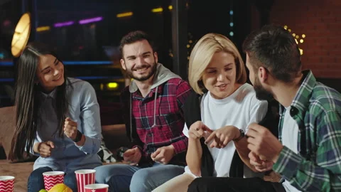 Relaxed atmosphere at home two couples spending a good time they socializing Stock Footage 135924612