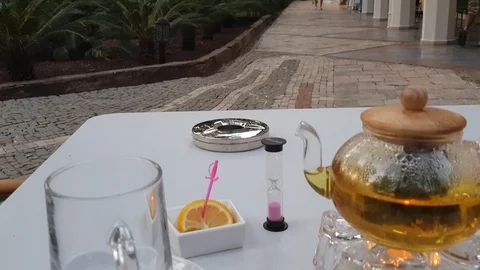 Relaxed black tea ceremony with nice glass cup and teapot Stock Footage 112404602