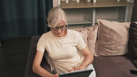 Relaxed digital reading Stock Footage 304810370