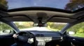 Relaxed driving on sunny road wide angle view from inside car HD Footage