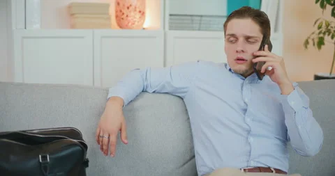 Relaxed Entrepreneur Talks to Client Stock Footage 276361242