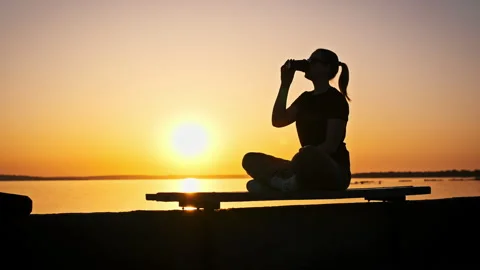 Relaxed Evening Coffee by the Lake Stock Footage 275882851