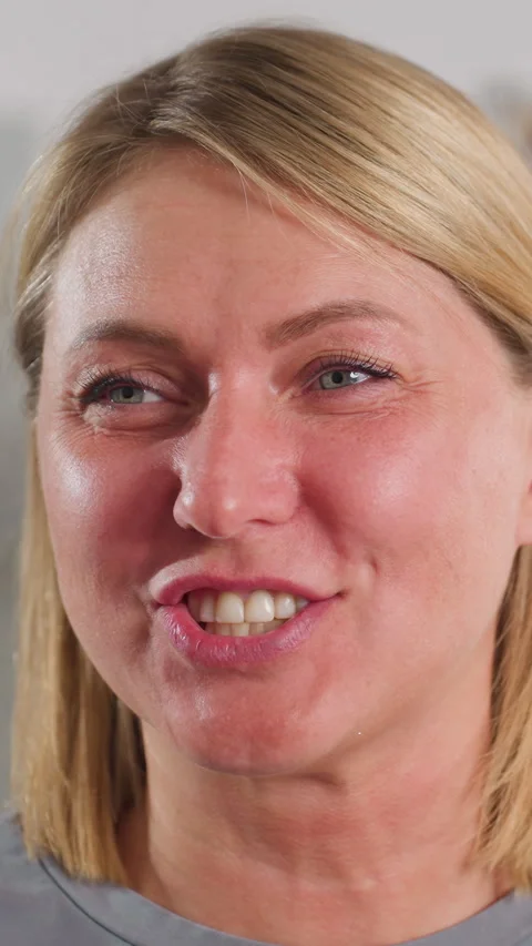 Relaxed female model expressing authentic happiness and approachability, Casual Stock Footage 323822929