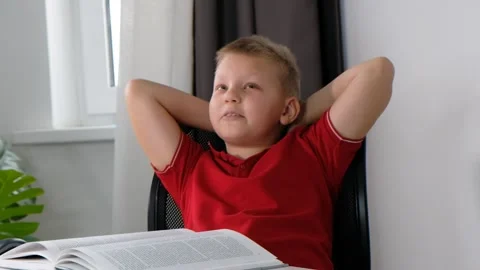 Relaxed happy school boy resting and smiling, healthy lazy calm rest, dreaming Stock Footage 201772536