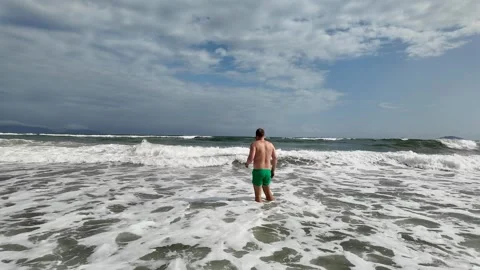 Relaxed Man in Waves Stock Footage 290080786