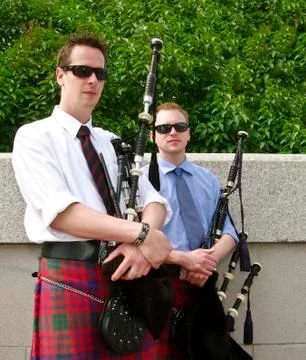 Relaxed pipers Stock Photos
