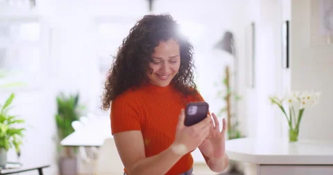 Relaxed young woman sitting using cell phone Stock Footage 301244072