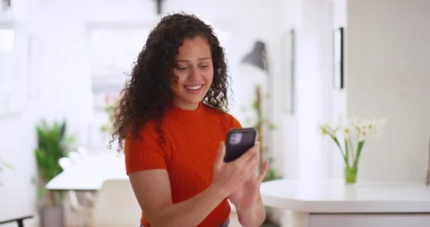 Relaxed young woman sitting using cell phone Stock Footage 301244514