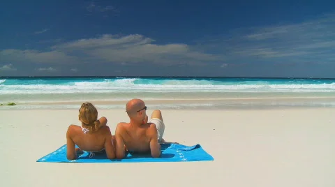 Relaxing on the beach Stock Footage 128725
