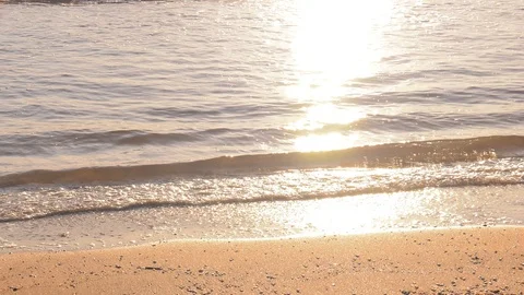 Relaxing Beach - Sunlit Waves On Calm Sandy Shore At Sunrise 4K Stock Footage 108422028