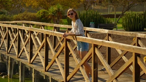 Relaxing on the bridge 스톡 동영상 107604556