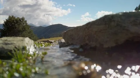 Relaxing close up spring water stream mountain Video stock 180987692