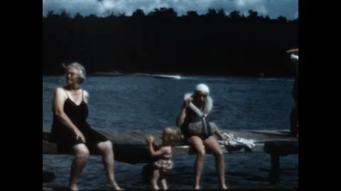 Relaxing on the Dock 1958 Stock Footage 145982976