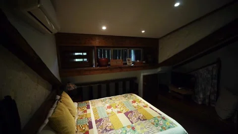 Relaxing double bed in tiny home style architecture Stock Footage 170515818