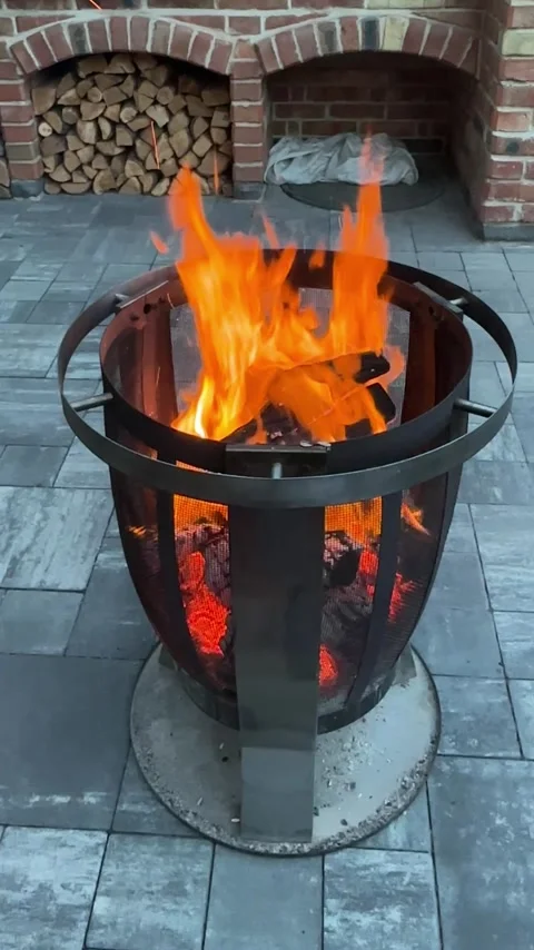 Relaxing evening with fire in backyard during autumn season at home Video stock 339574890