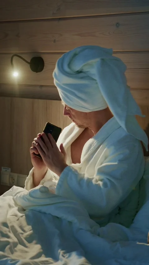 Relaxing evening routine with a man in Stock Video Pond5