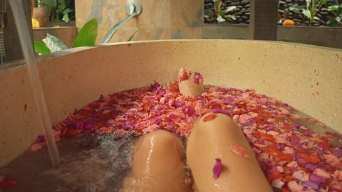 Relaxing in the flower bath at the SPA Stock Footage 104035652