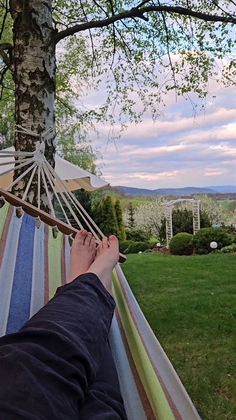 Relaxing in hammock POV view of green garden and hills. Stock Footage 341353065
