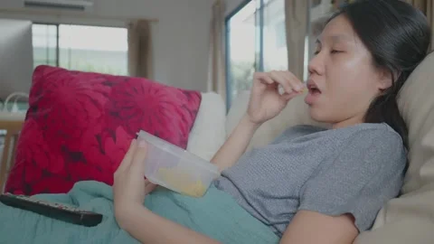 Relaxing at Home with Snacks Stock Footage 314511878
