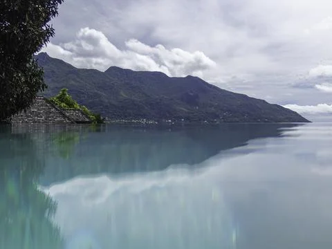 Relaxing In The Infinity Pool Stock Photos