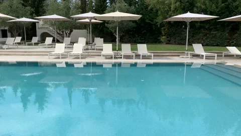 Relaxing infinity swimming pool Stock Footage 107476127