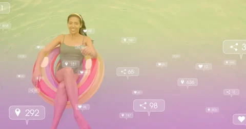 Relaxing on inflatable pool float, woman with social media interaction icons Stock Footage 304768144