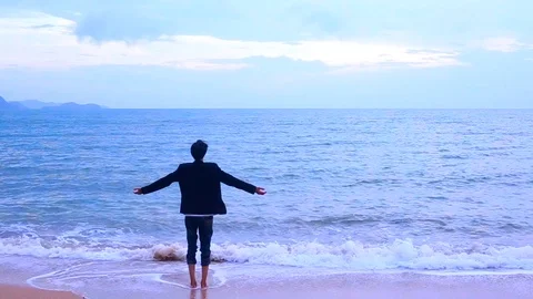 Relaxing man on the beach Stock Footage 94018557