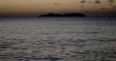 Relaxing Movement of Moving Waves on Ocean Sea Surface With Sunset Sunrise Stock Footage 71794029