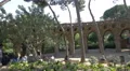Relaxing near the arcades of stone columns in Park Guell, Barcelona 4k or 4k+ Resolution