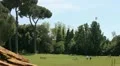 Relaxing at park (a dirigible in the sky) HD Footage