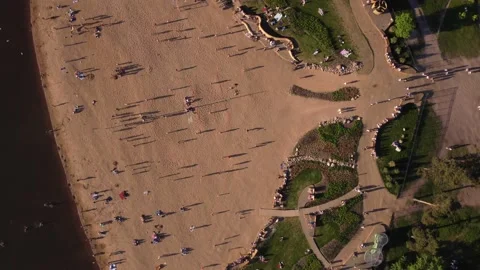 Relaxing people at the beach in city | Ozerki | Saint-Petersburg | Aerial View Stock Footage